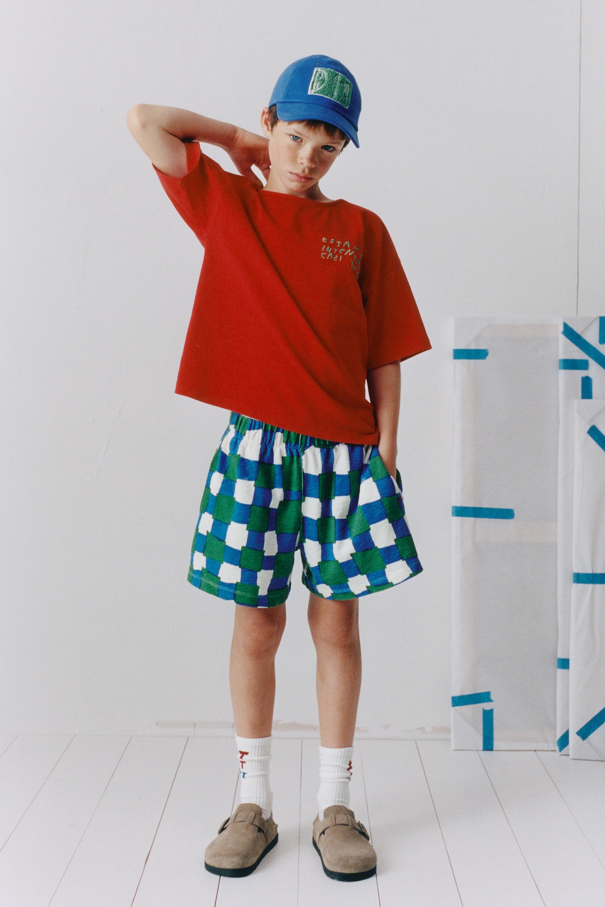 CLARA CEBRIAN © PLAID SHORTS